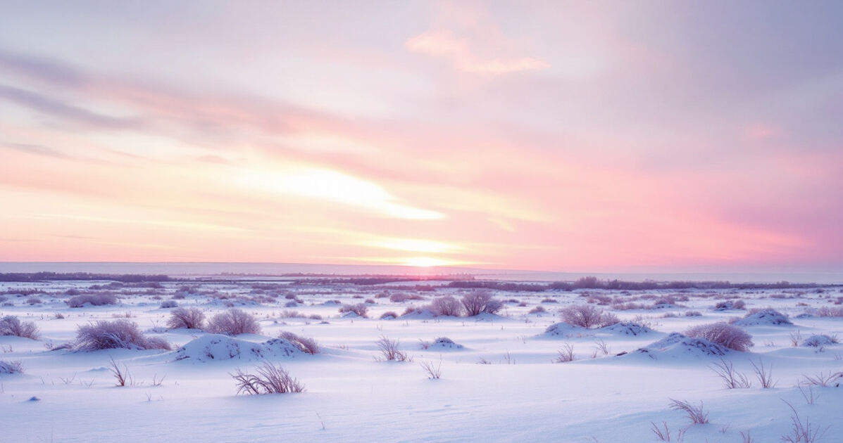 Snow-covered North Dakota prairie at winter sunset