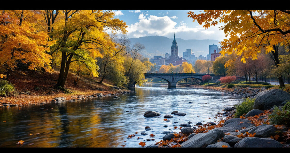 Genesee River flowing through an autumn city park with fall foliage